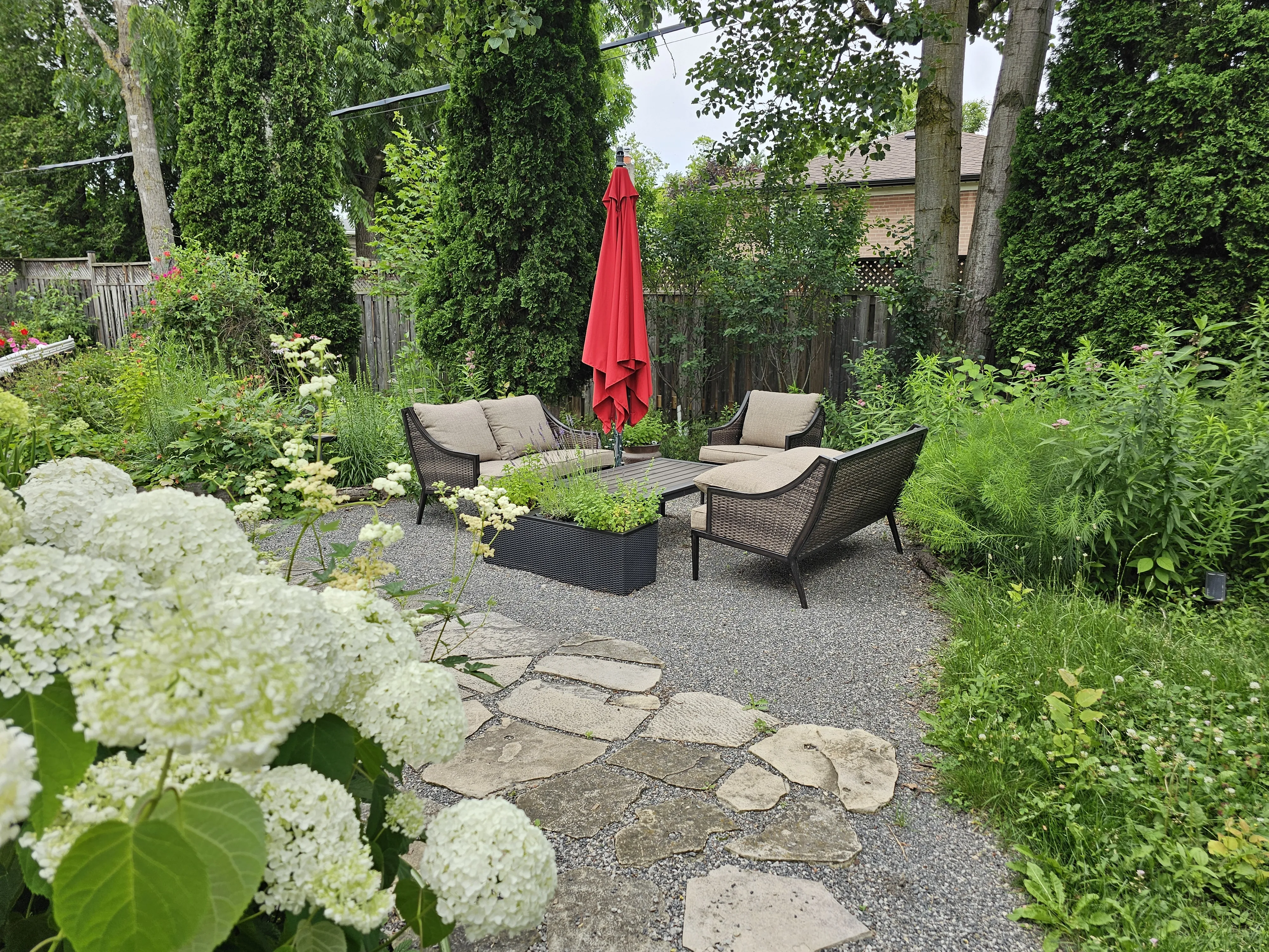 Flagstone path through native perennial garden