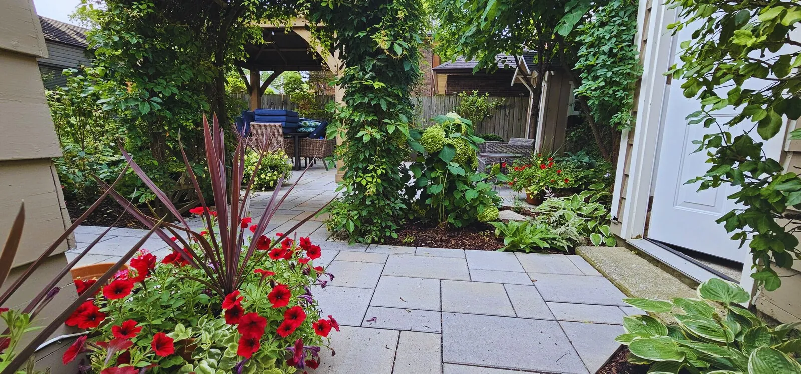 Flagstone patio with rain garden
