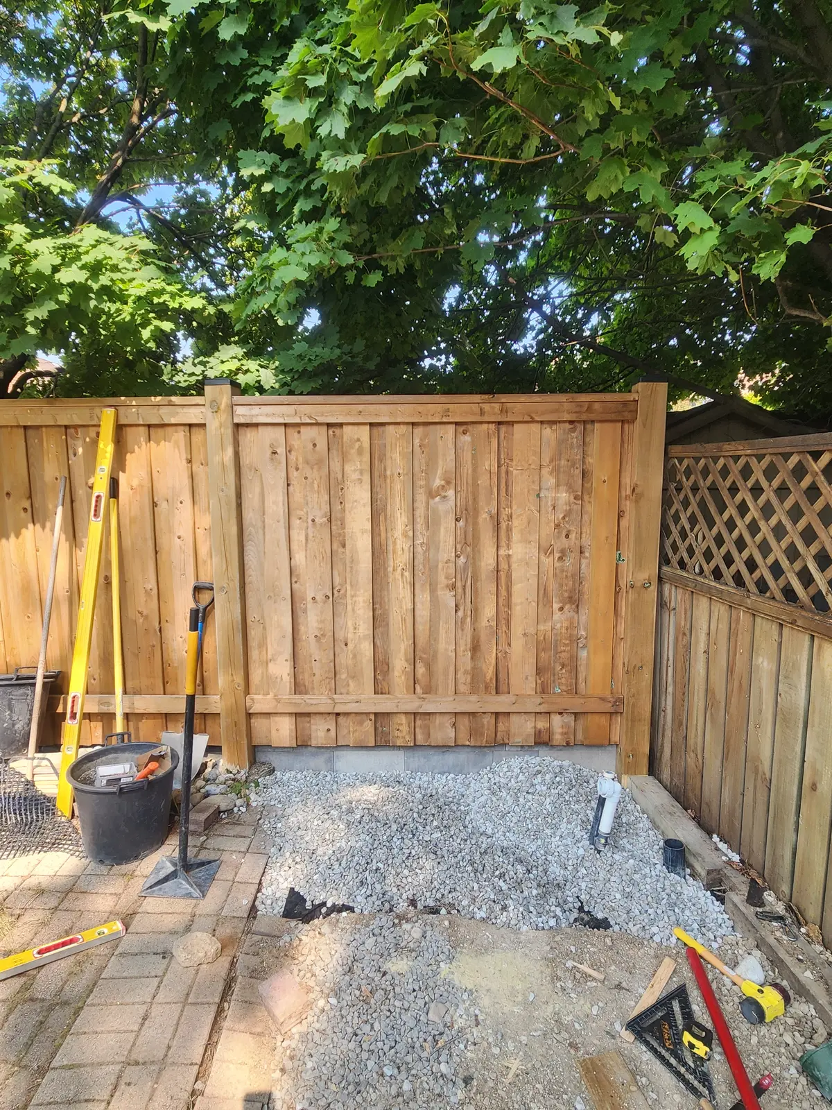 Horizontal board fence repair with lattice top detail