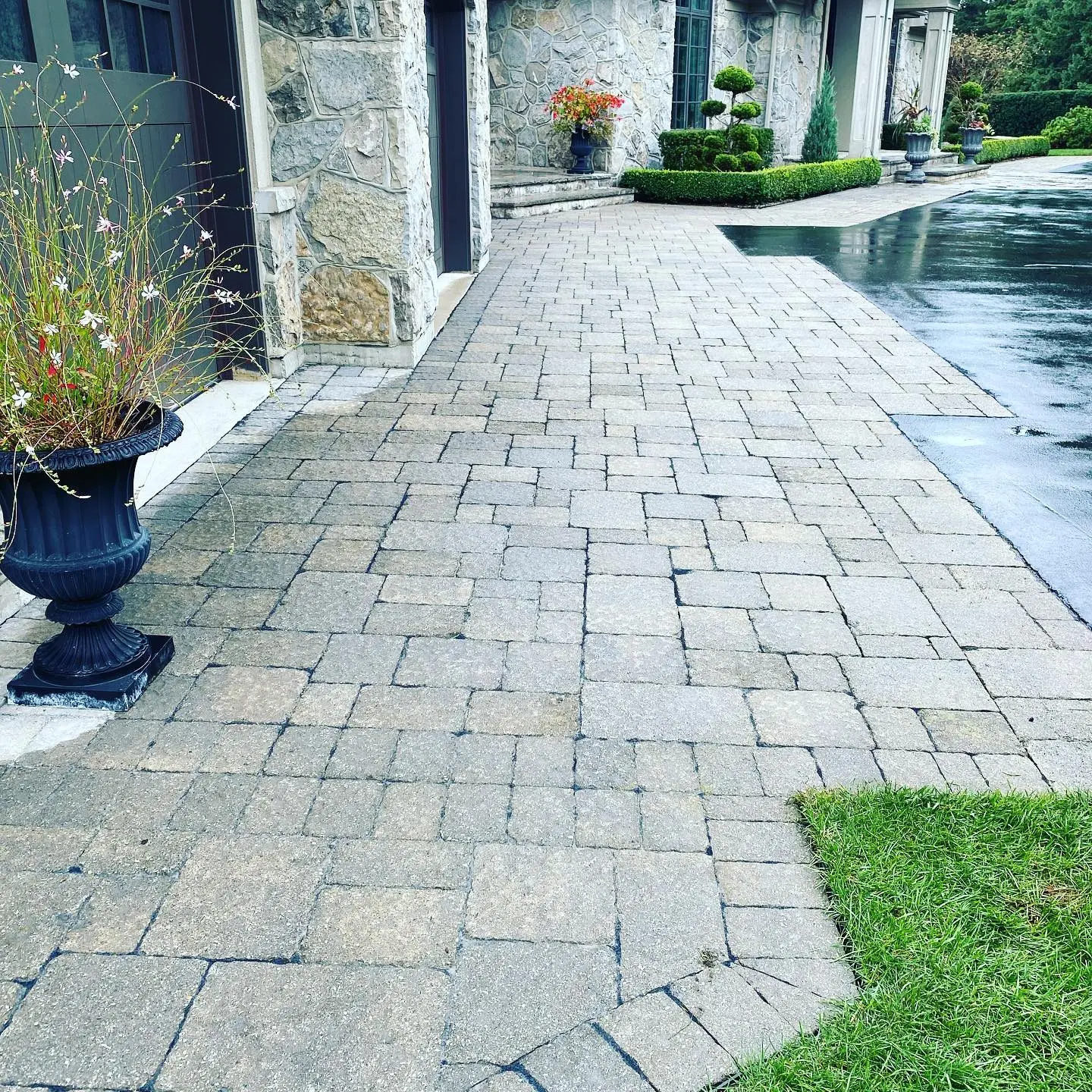 Interlocking stone front walkway at estate home