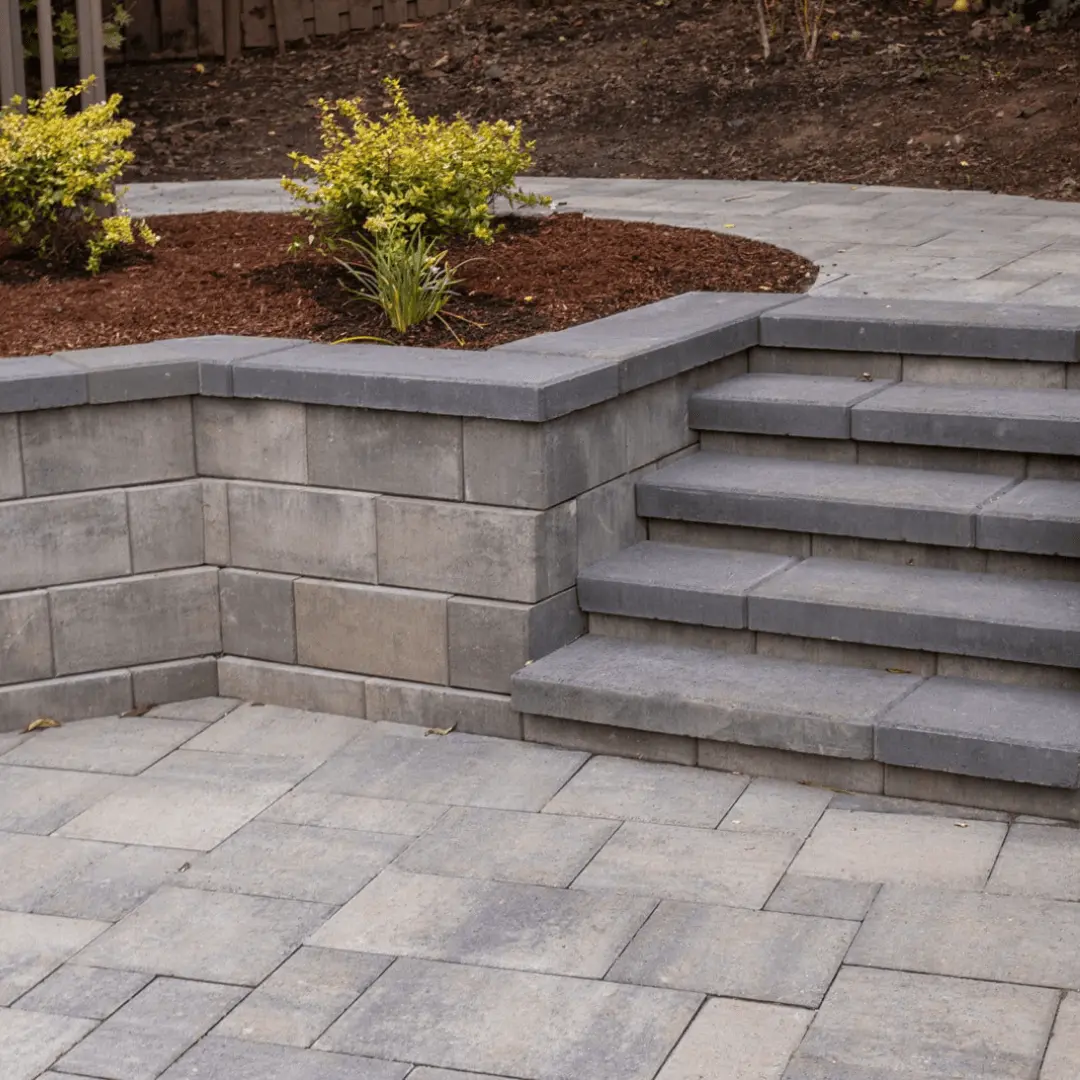 Interlocking paver steps with retaining wall & planting bed