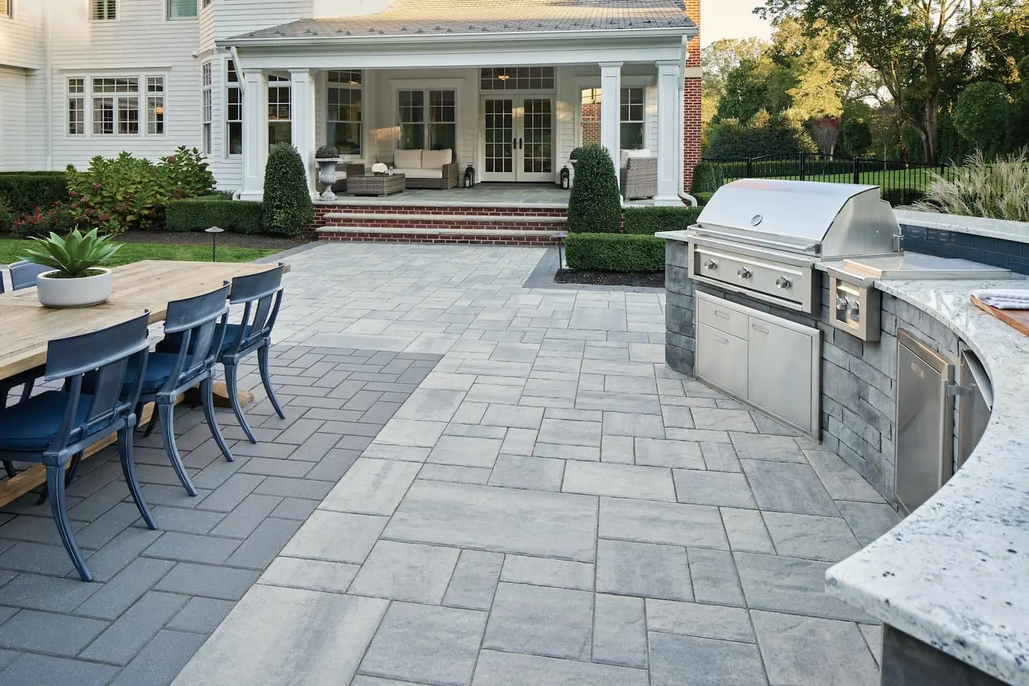 Paver patio with outdoor kitchen & dining area