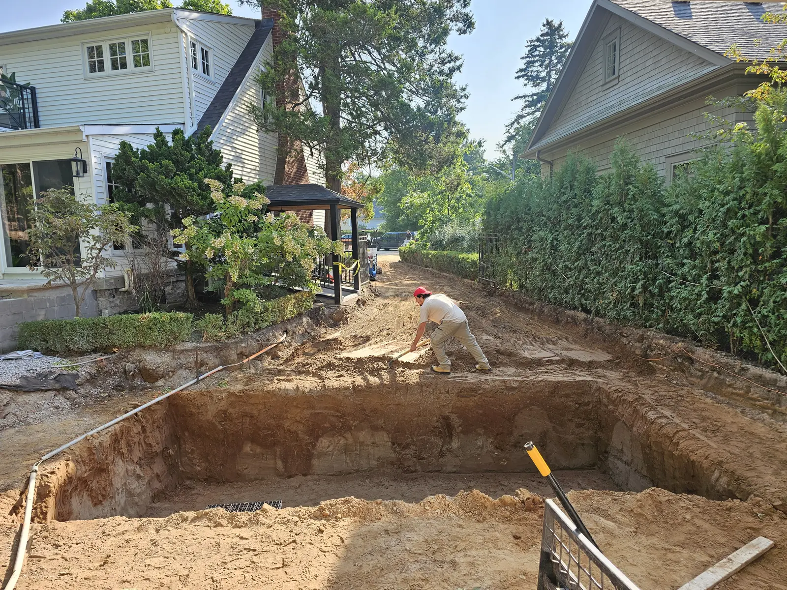 Driveway infiltration trench excavation in progress